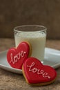 Heart red cookies and glass of milk