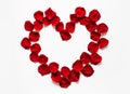 Heart of red rose flower petals on white background Royalty Free Stock Photo