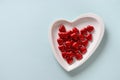 Heart red sweets, love letter and gift on blue. Valentine's day romantic invitation.