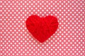 Heart of red threads on a background of cloth in polka dots. Red Royalty Free Stock Photo