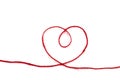 Heart from a red woolen thread on a white isolated background Royalty Free Stock Photo