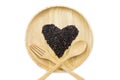 Heart rice berry in wooden bowls with spoon