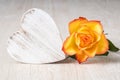 Heart and Rose Flowers on rustic table - Love Concept Royalty Free Stock Photo