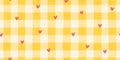 Heart seamless pattern vector with red confetti on yellow gingham background. Cute vichy check style for summer picnic, kitchen Royalty Free Stock Photo