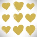 Set of cute gold hearts. Grunge hearts of different shapes Royalty Free Stock Photo