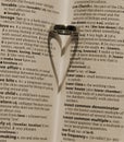Heart Shadow cast by a wedding band Royalty Free Stock Photo