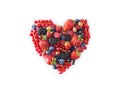 Heart shape assorted berry fruits on white background. Black-blue and red food. Ripe blueberries, red currants, raspberries, straw Royalty Free Stock Photo