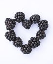 Heart Shape of Blackberries on White Background Royalty Free Stock Photo