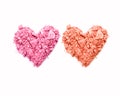 Heart shape of crushed eyeshadow isolated on white.