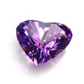 Heart Shape Crystal of Purple Amethyst Isolated on White.