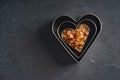 Heart shape cutters with brown sugar Royalty Free Stock Photo