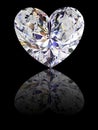 Heart shape diamond on glossy black background Royalty Free Stock Photo