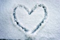 Heart shape drawn on snow