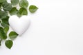 Heart shape with eco green small leaf white background