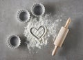 Heart shape in flour and baking equipment
