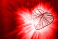 Heart shape frame being bonded and beaming light on red