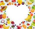 Heart shape frame made of different fruits and berries, isolated on white background Royalty Free Stock Photo