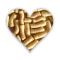 Heart shape full of corn puffs Royalty Free Stock Photo