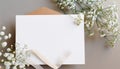Styled stock photo. Feminine wedding desktop stationery mockup with blank greeting card, baby`s breath Gypsophila Royalty Free Stock Photo