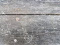 Heart shape graffiti carved in wood table