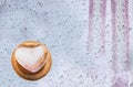 Heart shape ice on water drop mirror and knitting wool Scarf background Royalty Free Stock Photo