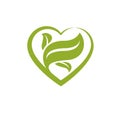 Vector heart shape illustration composed with green leaves. Living in harmony with nature concept, green health idea symbol. Royalty Free Stock Photo