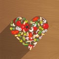 Heart shape italian food. Ingredients-tomato, olive, onion, mushroom, pasta, cheese,chili,garlic- on wooden background Royalty Free Stock Photo