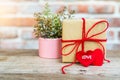 Heart shape with LOVE word, Gift box and flower, copy space for texting Royalty Free Stock Photo