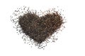 Heart shape made from black sesame seeds on a white isolated background Royalty Free Stock Photo