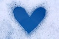 Heart shape made of detergent foam in water, top view. Hand washing laundry Royalty Free Stock Photo