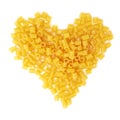 Heart shape made of dry ditalini pasta over isolated white background Royalty Free Stock Photo