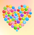 Heart shape made of glossy sweet candies lollipops multicolor