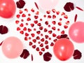 Heart shape made of hearts objects on white background with balloons and rose petals, happy valentine`s day, mother`s day, flat Royalty Free Stock Photo