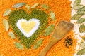 Heart shape made of mixed yellow wheat grains, white salt, green Royalty Free Stock Photo