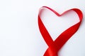 Heart Shape made of red ribbon on white wooden Background. copy space - Valentines and 8 March Mother Women's Day concept Royalty Free Stock Photo