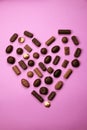 Heart shape made with various types of chocolate.Saint Valentines day concept Royalty Free Stock Photo