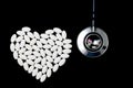 Heart shape made of white pills Royalty Free Stock Photo