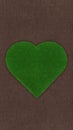 Heart shape of meadow green grass surface isolated on soil ground surface. Turf and terrain blank top view background. Gardening Royalty Free Stock Photo