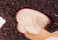 Heart shape from mix of jasmin rice and riceberry rice Royalty Free Stock Photo