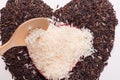 Heart shape from mix of jusmin rice and riceberry rice Royalty Free Stock Photo
