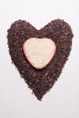 Heart shape from mix of jusmin rice and riceberry rice Royalty Free Stock Photo