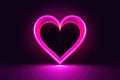 Heart shape neon luminance light on black wall black drop background