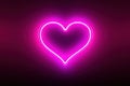 Heart shape neon luminance light on black wall black drop background