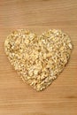 Heart shape oat flakes Royalty Free Stock Photo