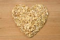 Heart shape oat flakes Royalty Free Stock Photo