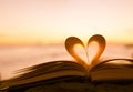 Heart shape paper book on the beach