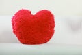 Heart shape pillow on sofa. Valentines day love. Royalty Free Stock Photo