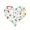 Heart shape pills. Royalty Free Stock Photo