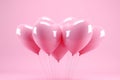 Heart shape pink balloons. Valentine's Day or Mother's Day elements against pink background