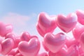 Heart shape pink balloons. Valentine's Day or Mother's Day elements against blue sky background